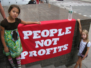 People Not Profits banner (cc photo: edenpictures)