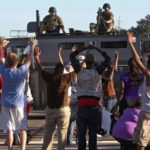 Ferguson police, protest
