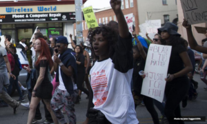 Baltimore protesters (photo: John Taggart/EPA)