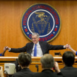 FCC commissioners celebrate net neutrality ruling. (photo: Pablo Martinez Monsivais/AP)