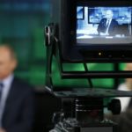 Putin on RT (Photo: YURI KOCHETKOV/AFP/Getty Images)