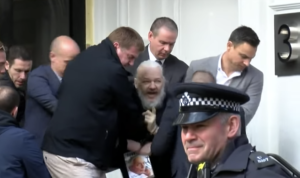 Julian Assange being arrested by British police (image: Ruptly)