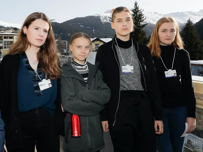 Climate youth activists with Vanessa Nakate cropped out by AP.