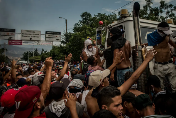 underexposed New York Times photo of a Venezuelan protest