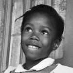 Ruby Bridges. the first Black child to attend an all-white school in New Orleans.