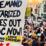 Image from the Nation of DC protest: "We demand militarized forces out of DC now!" Photo: Chuck Modiano