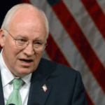 AP depiction of Dick Cheney in front of American flags