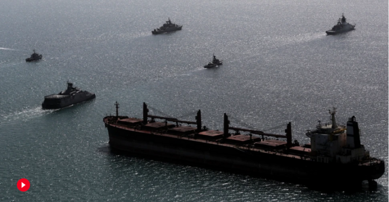 AP depiction of an oil tanker with warships