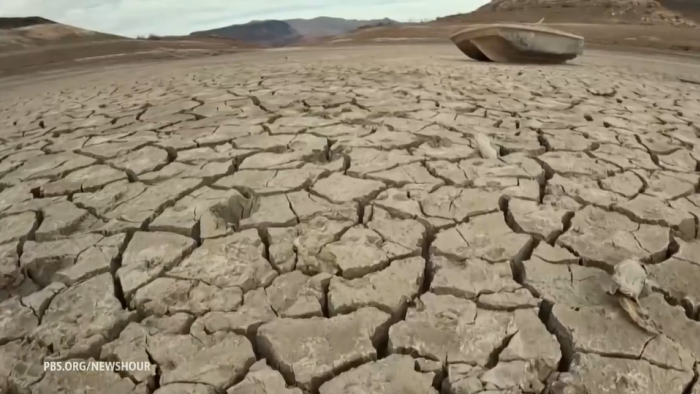 Image of dried up lake from PBS NewsHour