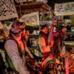 New York Times depiction of the celebration of 5th anniversary of the end of the US occupation of Afghanistan.