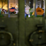 The locked gates of Harvard Yard during the Gaza encampment (Boston Globe photo by Andrew Burke-Stevenson)
