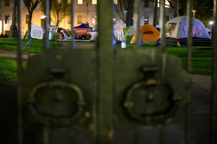 The locked gates of Harvard Yard during the Gaza encampment (Boston Globe photo by Andrew Burke-Stevenson)